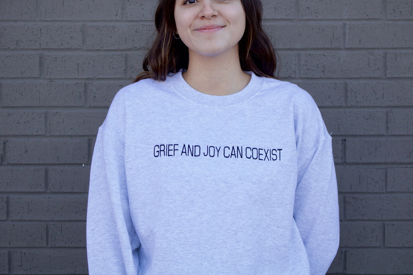 GRIEF AND JOY CAN COEXIST EMBROIDERED HEAVY BLEND UNISEX CREWNECK