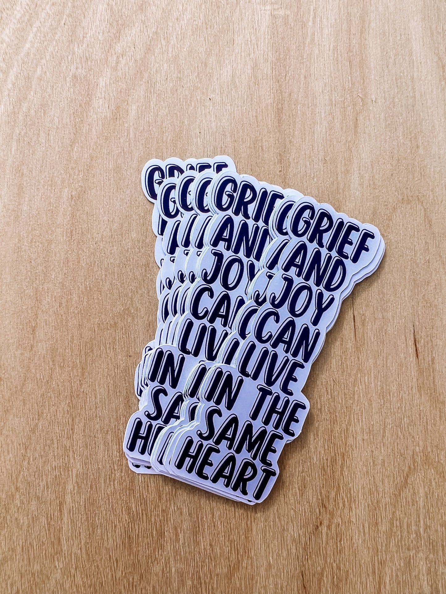 GRIEF AND JOY CAN LIVE IN THE SAME HEART STICKERS